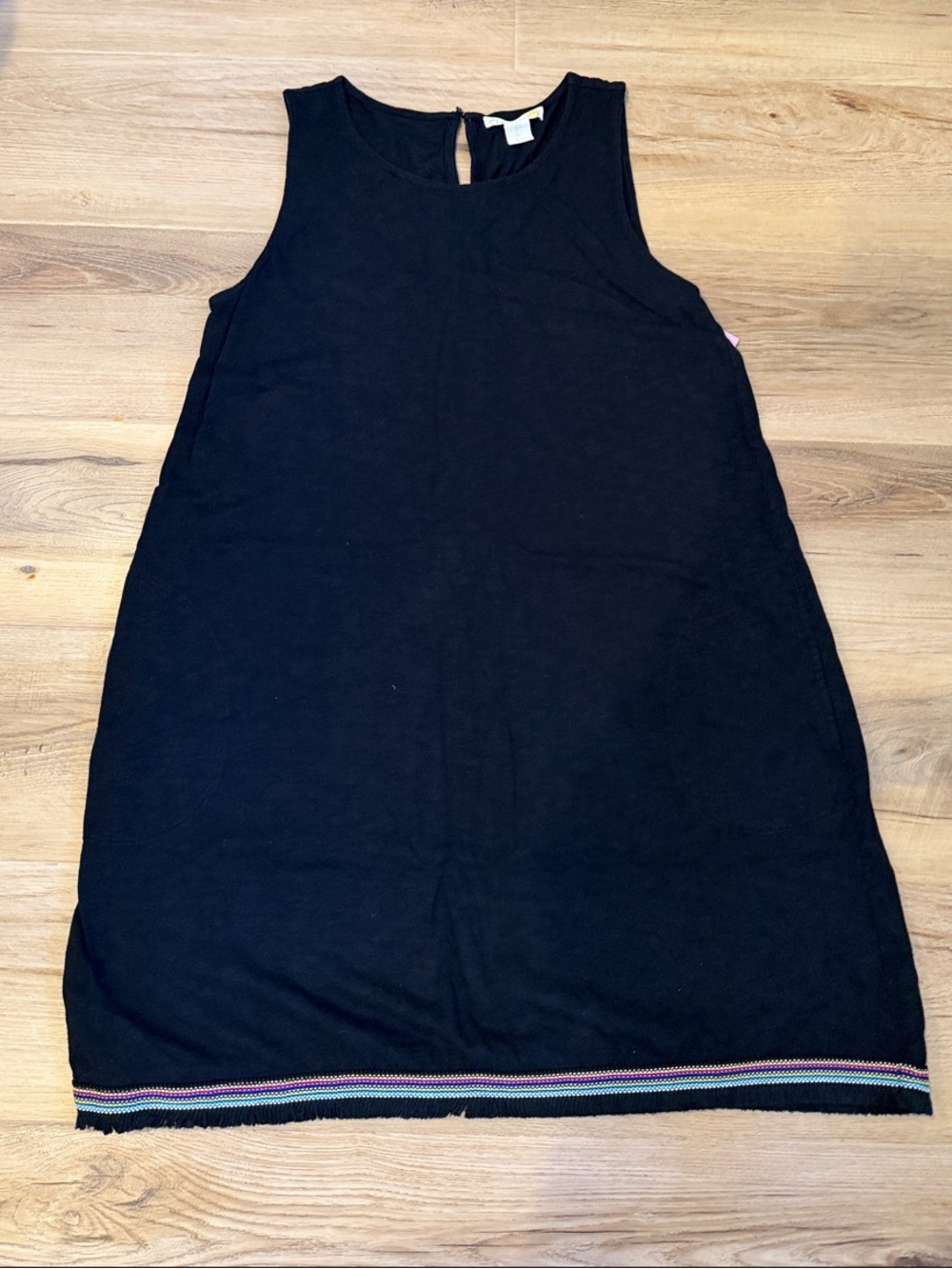 Black Sleeveless Shift Dress with Subtle Hem Stripe